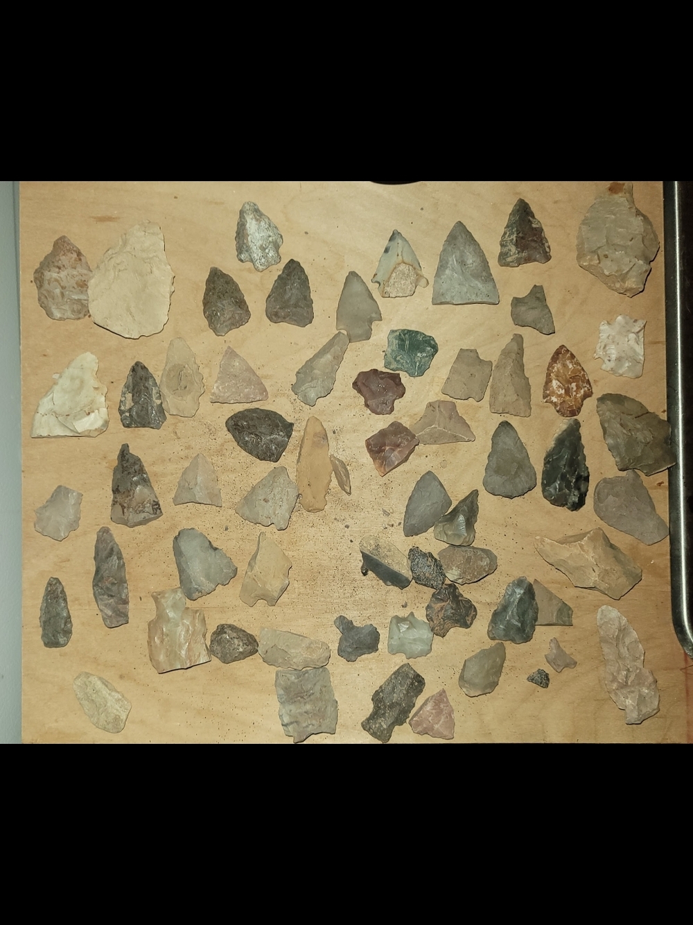 BAG FULL OF APPROXIMATELY 60+ OLD NATIVE AMERICAN ARROWHEAD RANGING IN CONDITION
